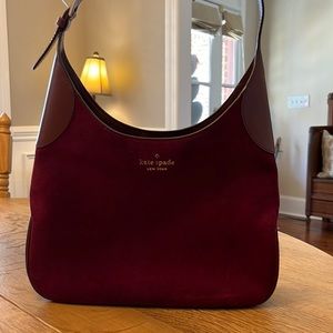 Burgundy, suede and leather Kate Spade shoulder bag.